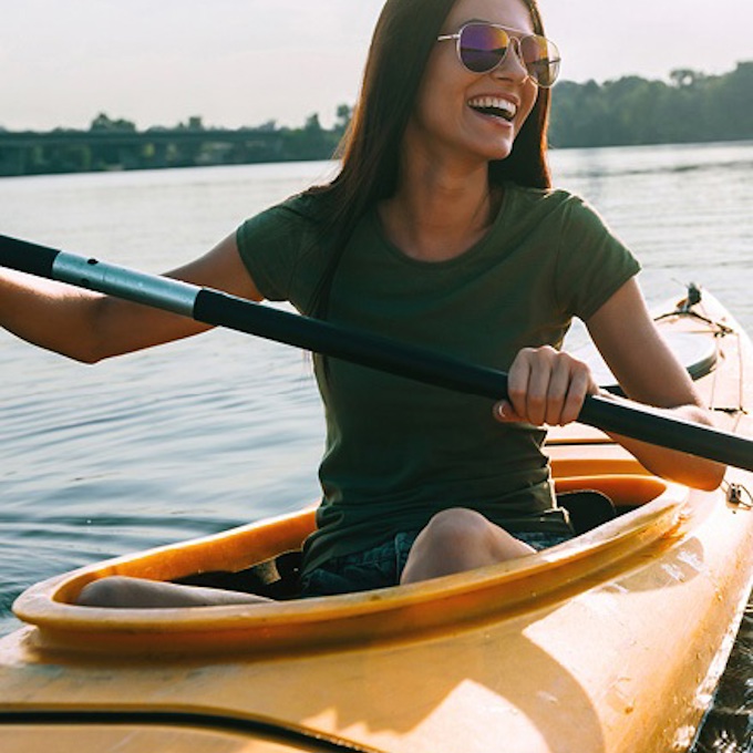 woman in canoe on a lake