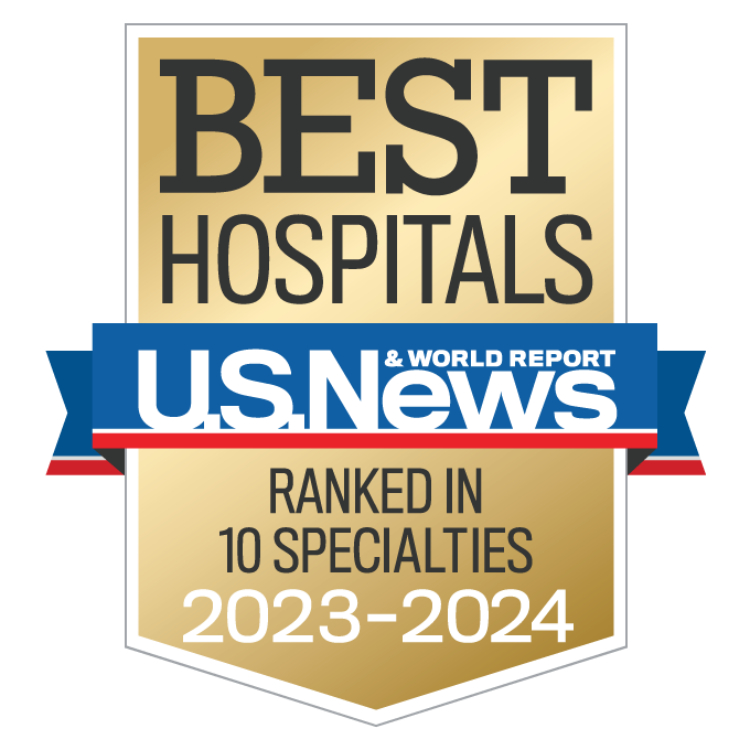 Rectangular gold-colored badge with the words “Best Hospitals, US News & World Report, Ranked in 10 Specialties, 2023-2024”