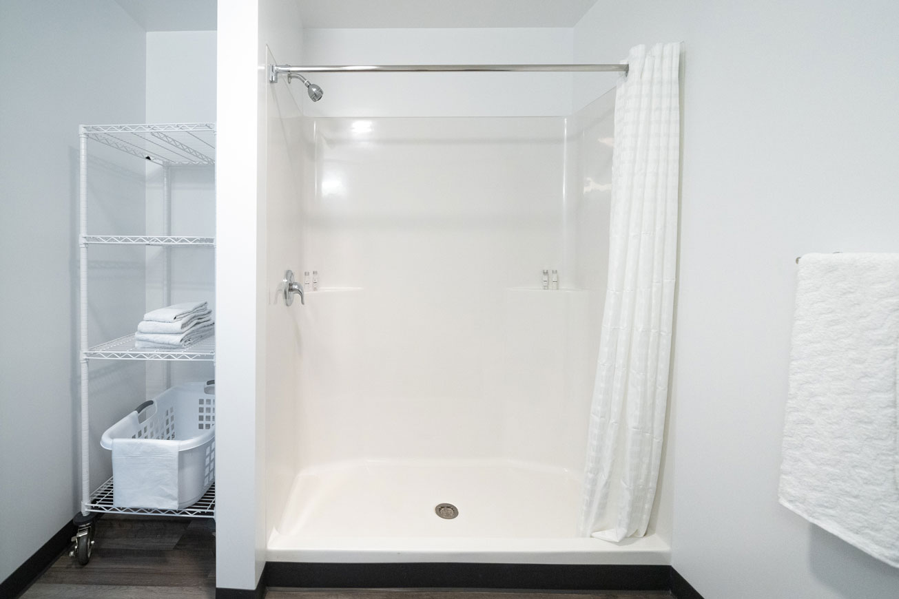 Guest room shower and storage