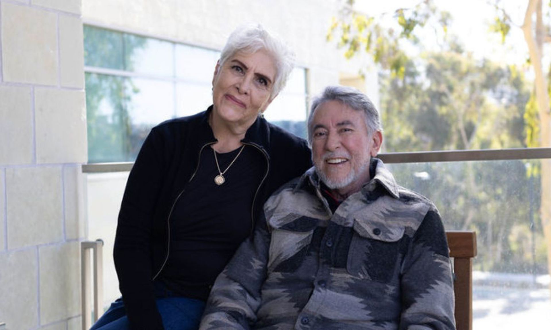 Daniel Campos and his wife, Cecilia, sit side by side at Moores Cancer Center