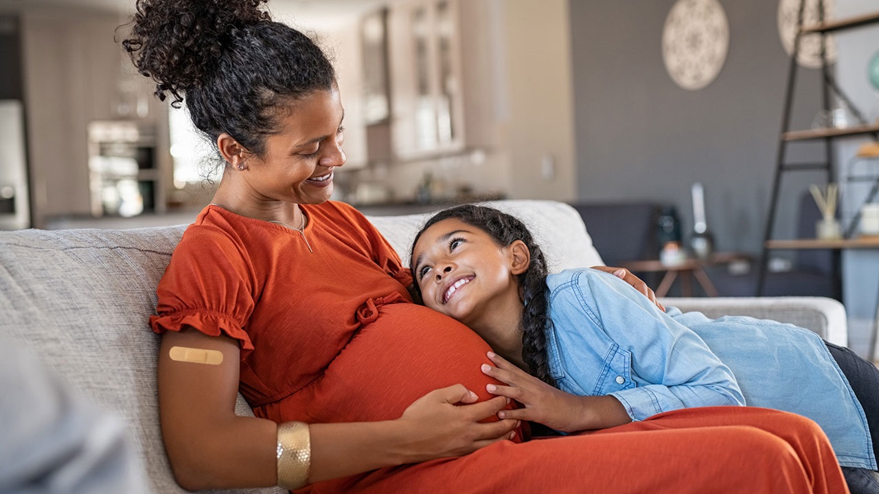 Pregnant patient with young girl