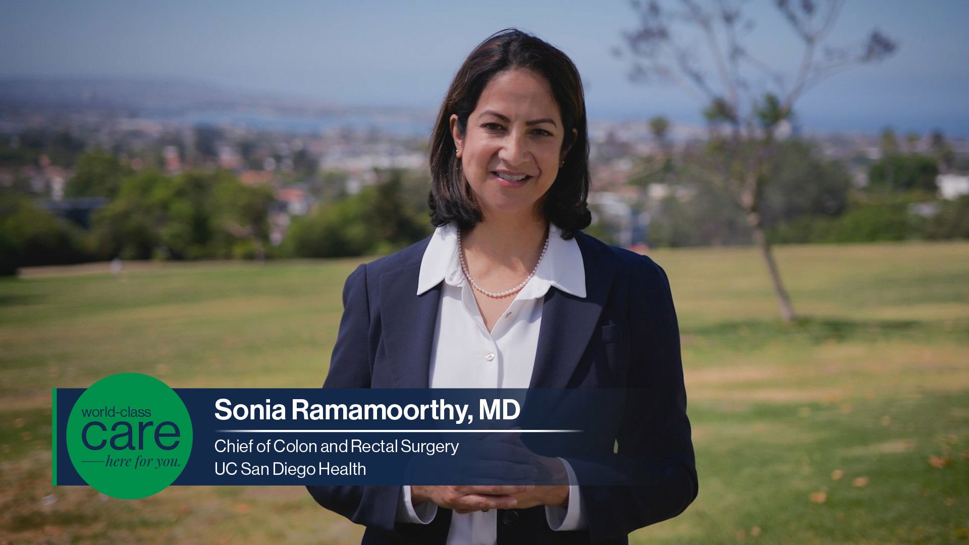 Colorectal surgeon Dr. Sonia Ramamoorthy shown with a graphic with the words "world-class care here for you"